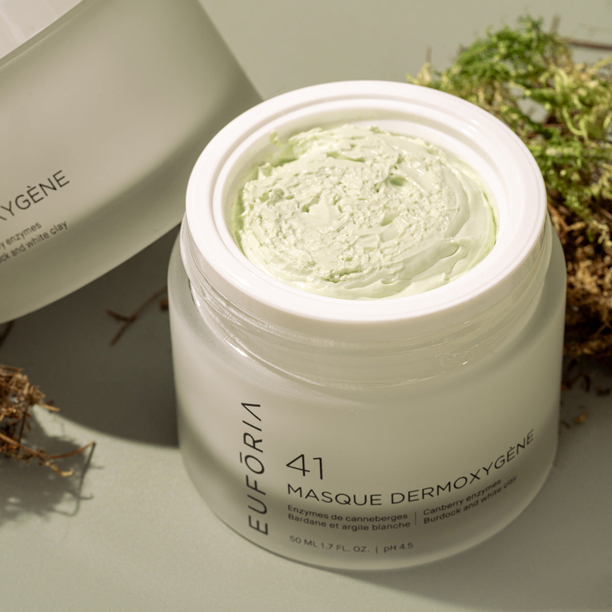 Pot de masque Dermoxygène #41, 50 ml, contenant un masque vert clair à la texture crémeuse.
