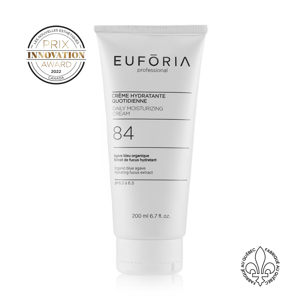 Crème Hydratante Quotidienne #84 : Tube de Crème Hydratante Quotidienne #84, 200 ml, avec étiquette indiquant "Agave bleu organique", "Extrait de fucus hydratant", décoré du prix "Innovation Award 2022" et du label "Fabriqué au Québec".