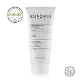 Crème Hydratante Quotidienne #84 : Tube de Crème Hydratante Quotidienne #84, 200 ml, avec étiquette indiquant "Agave bleu organique", "Extrait de fucus hydratant", décoré du prix "Innovation Award 2022" et du label "Fabriqué au Québec".